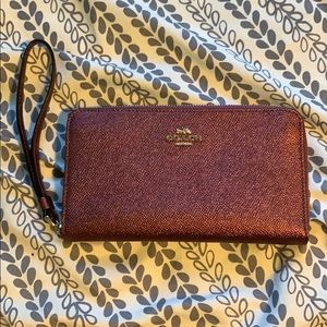 Coach metallic wine wristlet